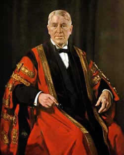 Man in suit and red scholarly robe