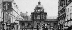 Building with dome flanked by other buildings