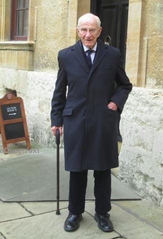 Dr. Bill Frankland, an elderly man with a cane outside of a building, who investigated allergies.