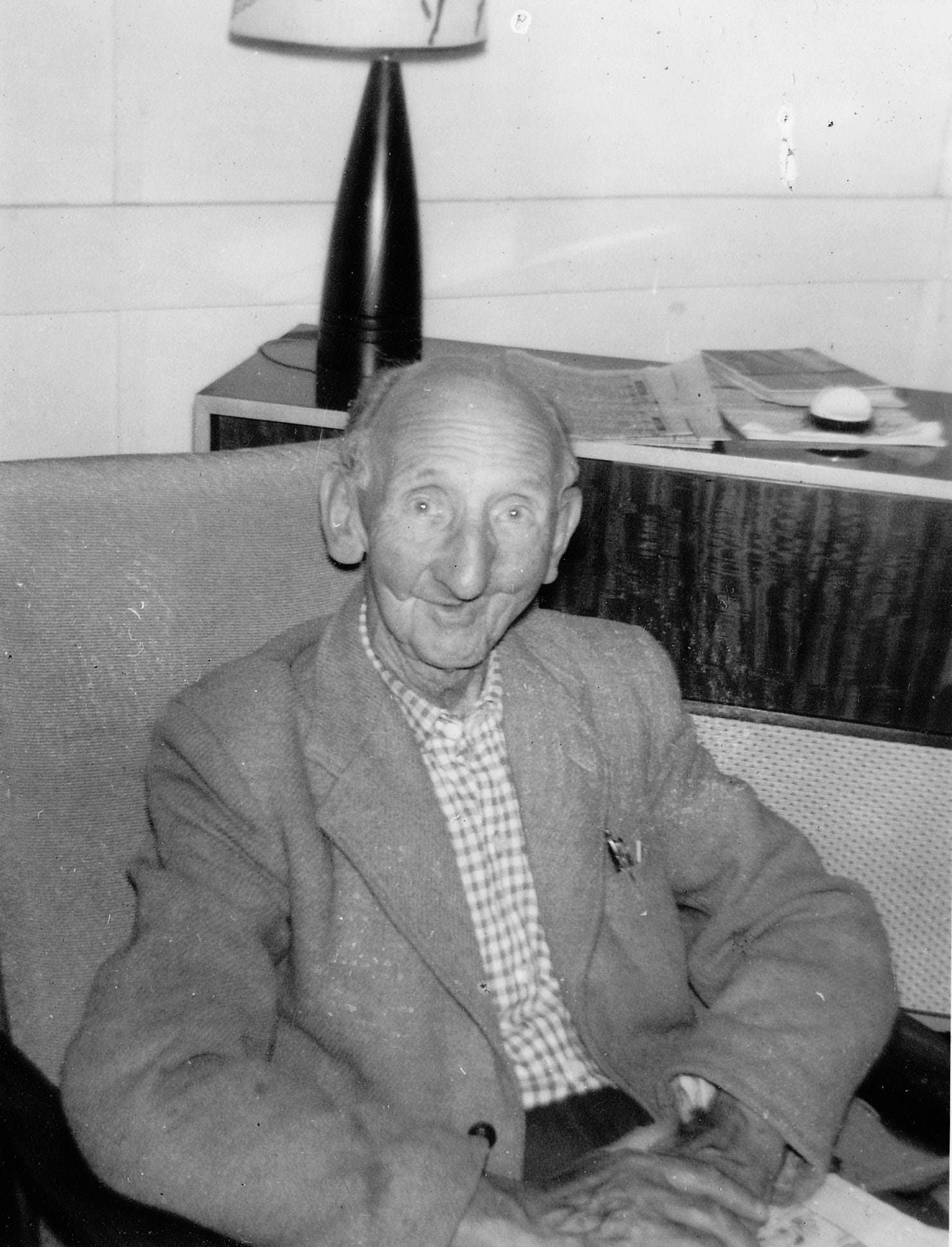 Black and white photograph of a patient many years after recovering and reconstruction from facial injury.