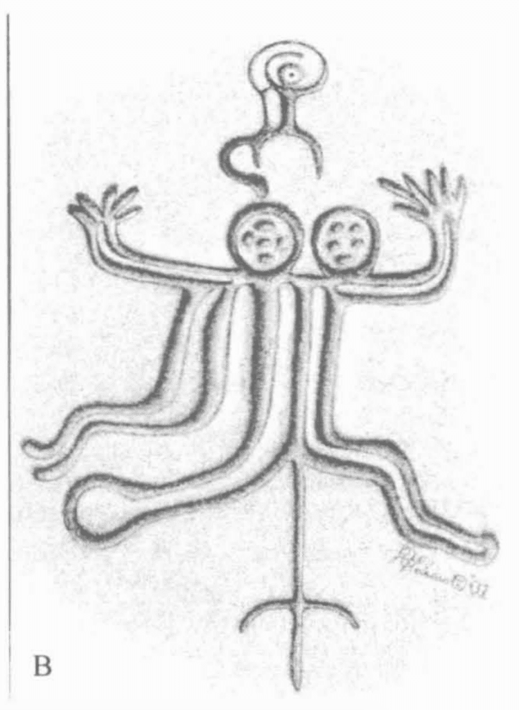 Two headed carving, possibly conjoined twins