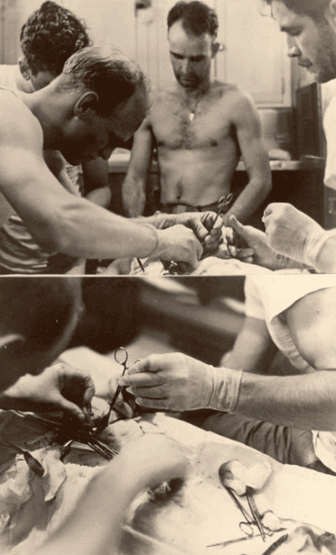 A physician performs an atypical appendectomy on a submarine